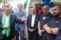 Bundesinnenminister de Maizière zu Besuch am Stand der Malteser Flüchtlingshilfe